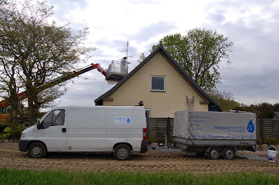 Vestergaards tagrens logo